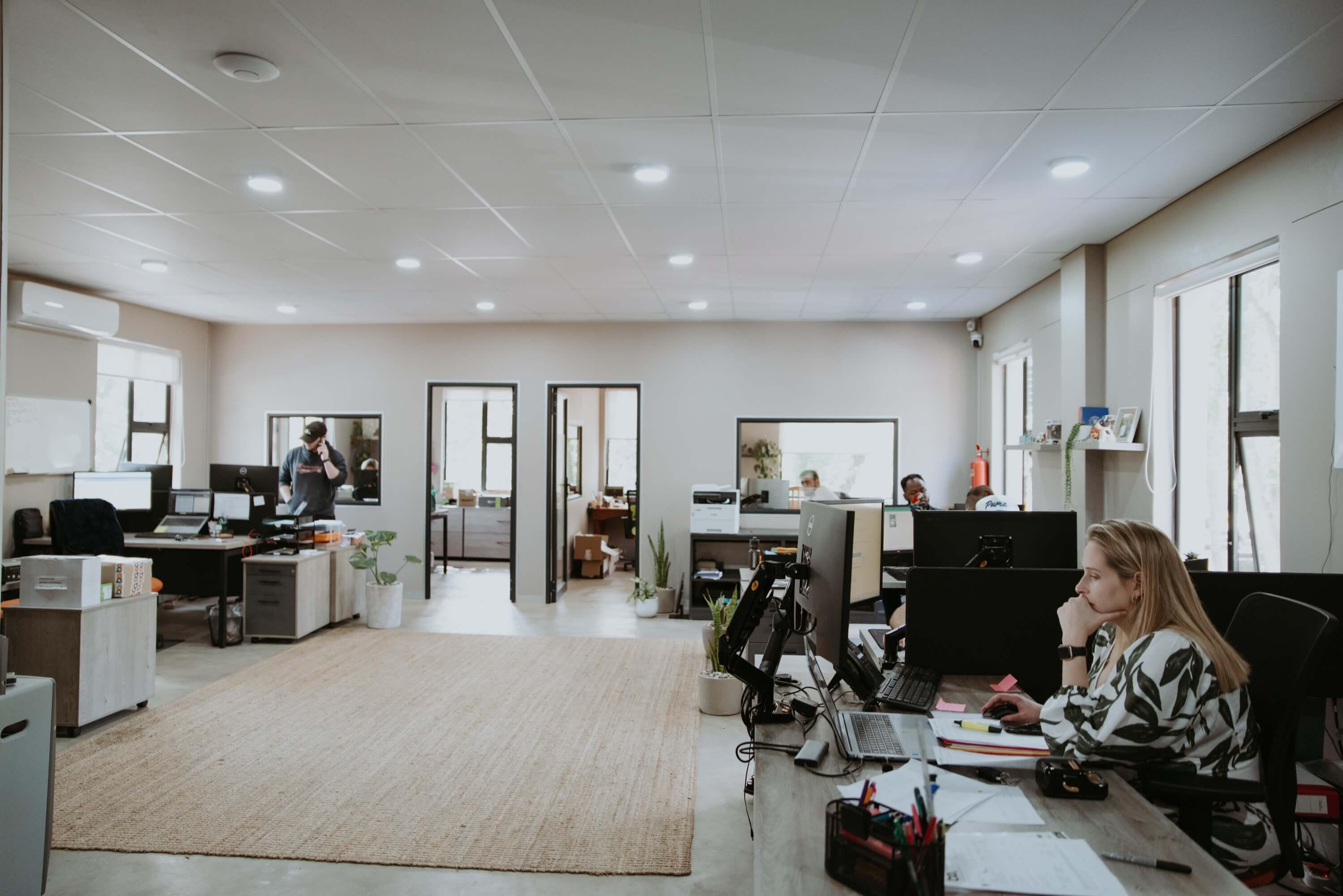 Happy South African business team celebrating success with Beyond Attendance time tracking solutions